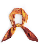 A knotted silk scarf featuring an elegant orange and brown design, showcasing a blend of warm colors and textures.