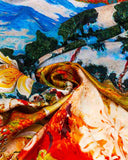 A close-up of a vibrant silk scarf featuring intricate floral and tree patterns in a colorful design.