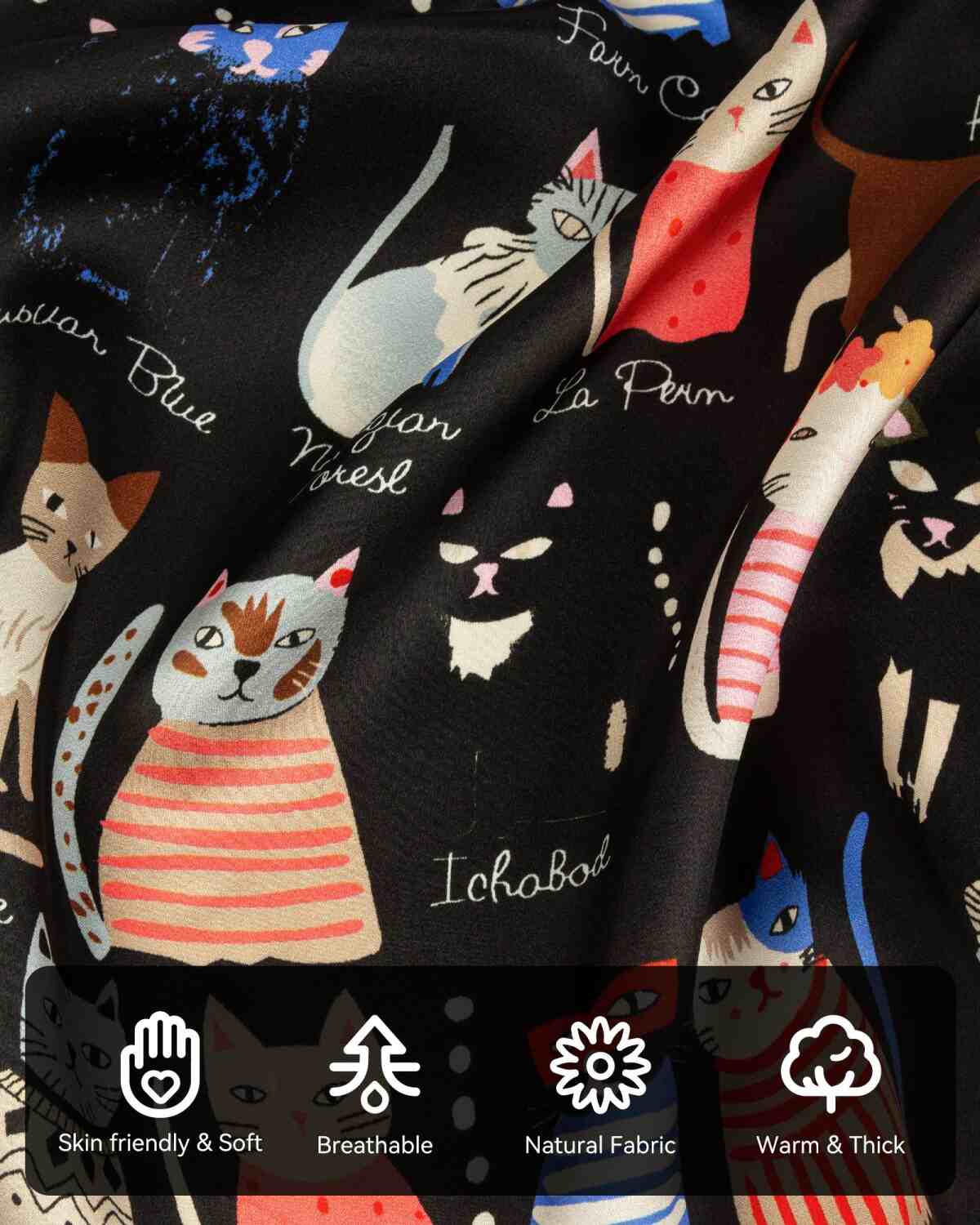 Close-up of a silk scarf featuring a vibrant cat print fabric with various colors and intricate designs.